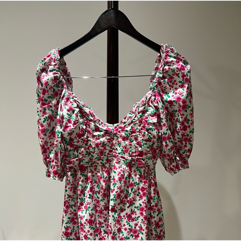 Used. Like new. Imperial short dress with puffy short sleeves. Size Small